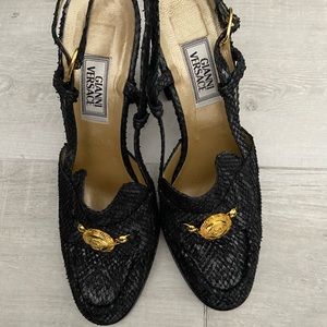 Original Versace black leather heeled sling back great condition ladies shoes.